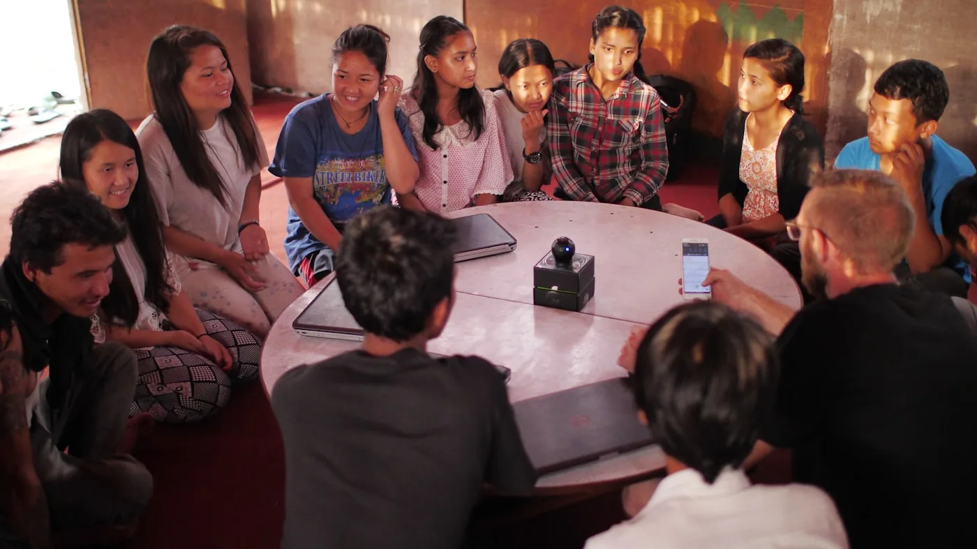 Participants seated in a circle during a focus group conversation